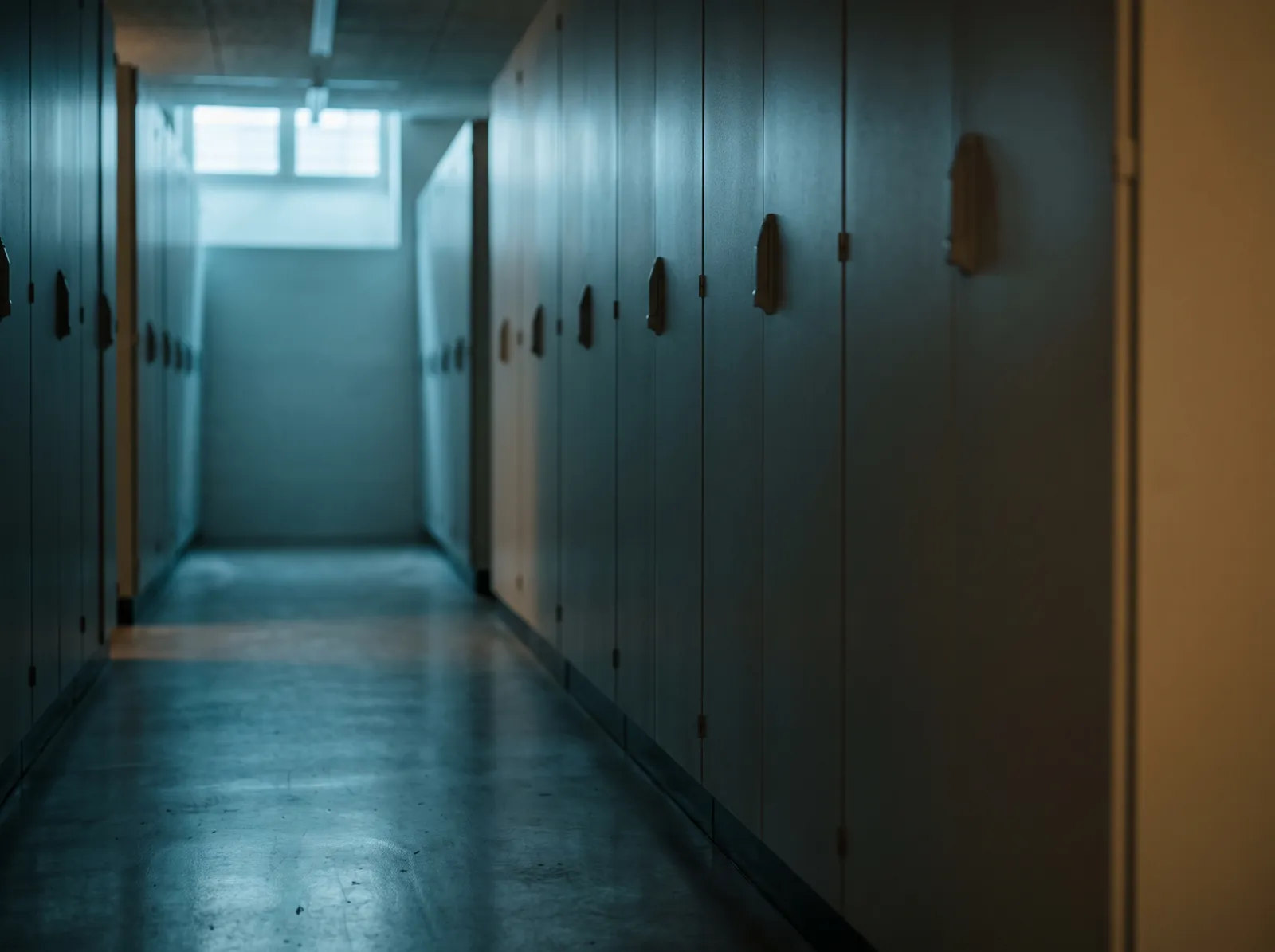 An empty corridor of cupboard doors